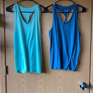 TWO twist back active tanks